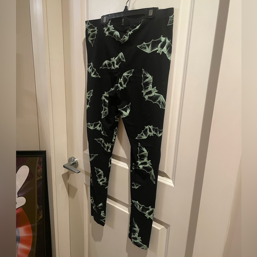 Dolls Kill Black Leggings with Green Bat Design - Picture 3 of 5
